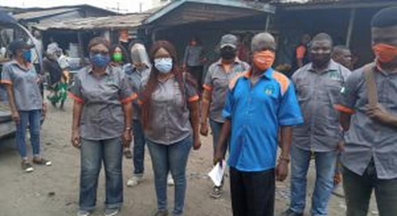 The National Emergency Management Agency (NEMA) Team led by Alhaji Ibrahim Farinloye (3rd right), the Acting Coordinator, Lagos Territorial Office, at the flag-off of the Door to Door 2020 Flood Awareness and Sensitisation Campaign on Prevention, Management and Mitigation of Flood on Tuesday in Mushin, Lagos.   [NAN]