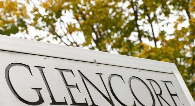 The logo of commodities trader Glencore is pictured in front of the company's headquarters in Baar, Switzerland, September 30, 2015. 