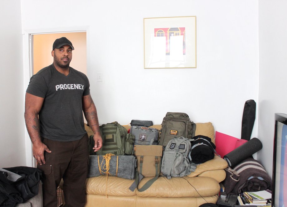 Jason Charles, president of the NYC Preppers Network, inside his Harlem apartment.