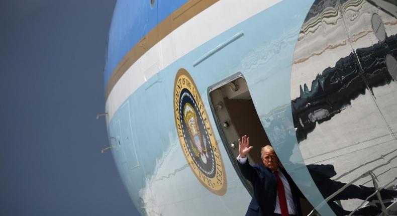 President Donald Trump waves from Air Force One in Miami on July 10, 2020