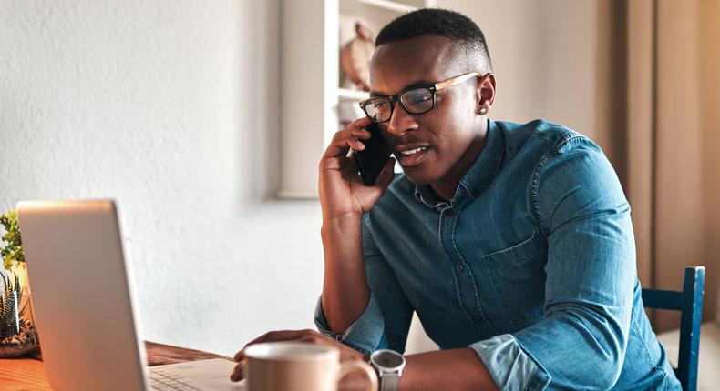 man working from home with laptop