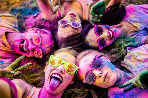 Multi-Ethnic Group Taking a Selfie at Holi Festival