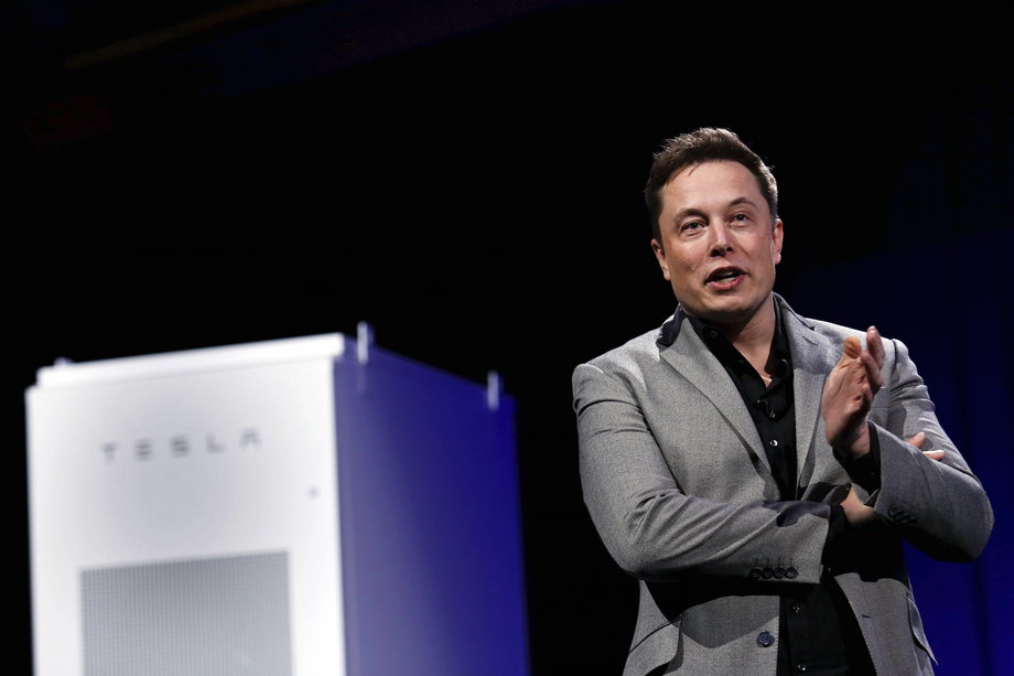 Musk with a Tesla Energy battery.