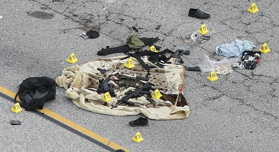 Weapons and other evidence on a tarp in San Bernardino, California.