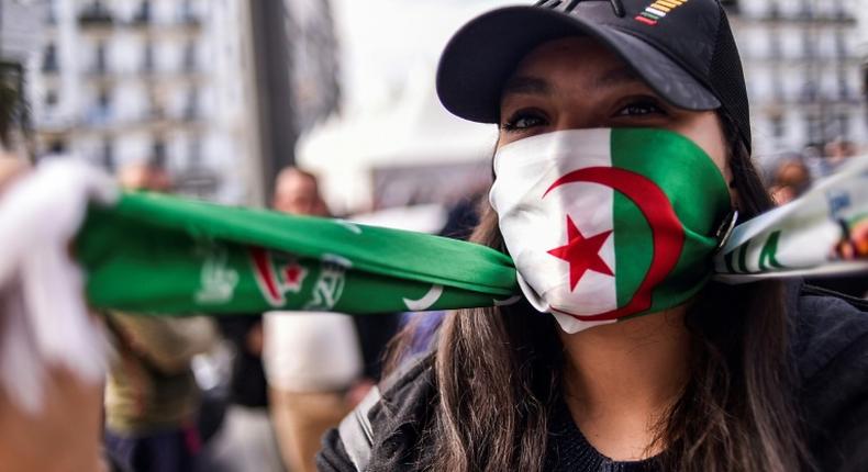 Algerian students demonstrate with national flags in the capital on Sunday against ailing President Abdelaziz Bouteflika's bid for a fifth term