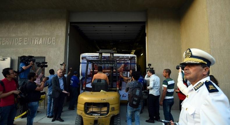 The gilded bed of the ancient Egyptian boy-king Tutankhamun arrives at the newly-constructed Grand Egyptian Museum