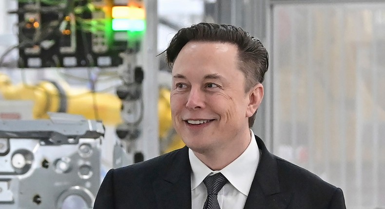 Neuralink, the brain interface company co-founded by Elon Musk — here touring a Tesla factory — sparked investor interest in brain computer interfaces.Patrick Pleul/AP