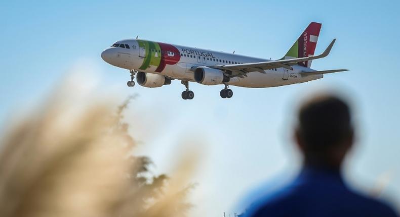 A plane of Portuguese TAP airline prepares to land at Humberto Delgado airport in Lisbon in October 2018