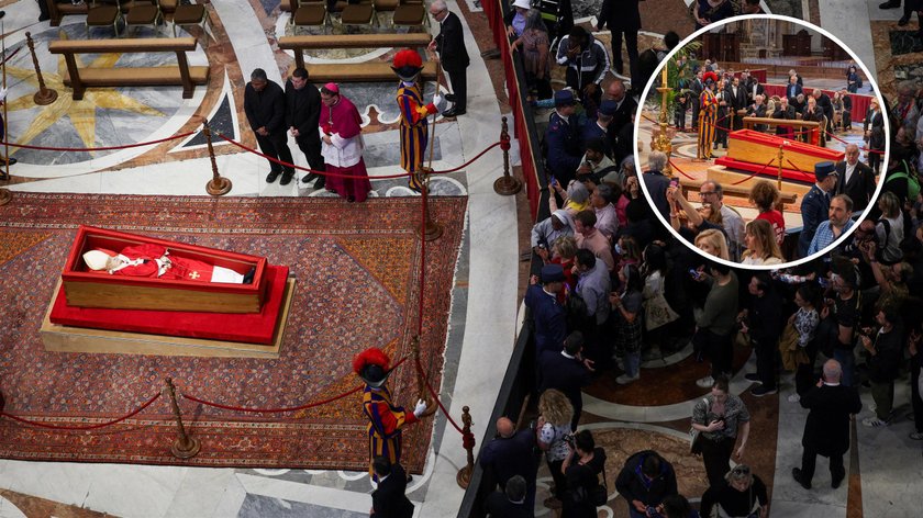 Vatican. People take pictures of the deceased pope