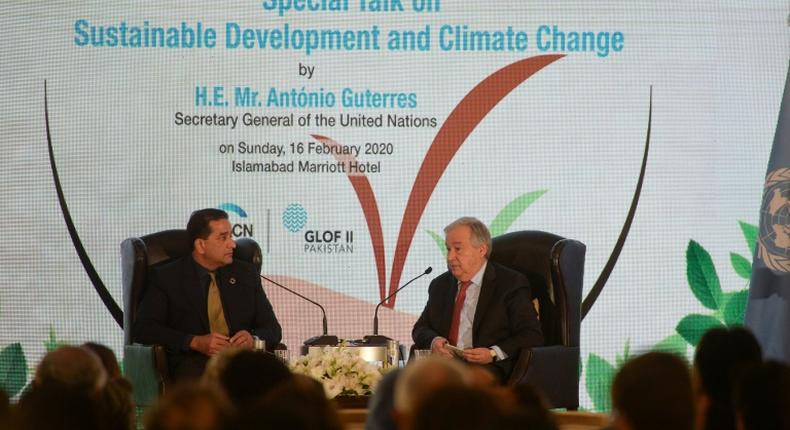 United Nations Secretary-General Antonio Guterres (R), pictured during a question and answer session at an event on sustainable development and climate change in Islamabad, said too many decision makers continue to fiddle while the plant burns