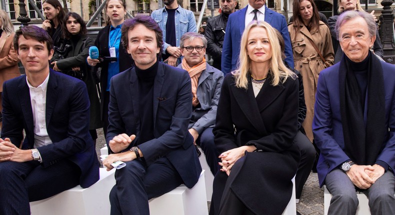 Alexandre Arnault, Antoine Arnault and Delphine Arnault with their father Bernard.Vianney Le Caer/AP