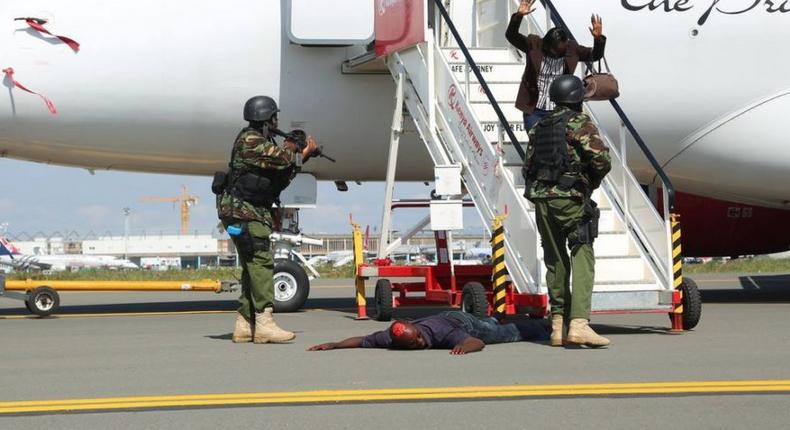Police officers conducting a security drill at JKIA