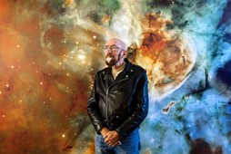 PASADENA - CA - NOVEMBER 11, 2014 - Astrophysicist Kip Thorne photograph in front of a stellar mural