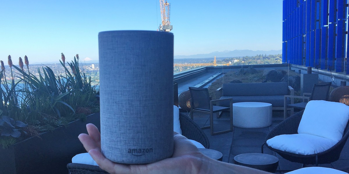 The new Amazon Echo fits neatly in the palm of your hand.