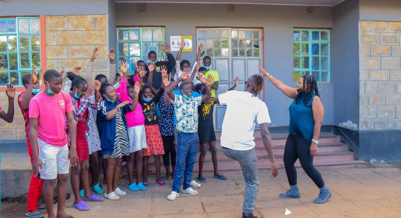 Guardian Angel visits Kariobangi Outreach children’s home, with  Malawian singer Wendy Favour Harawa 