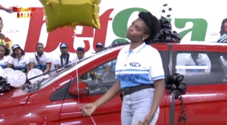 Khafi poses with her newly won car after the Innoson challenge. [Twitter/BBNaija]