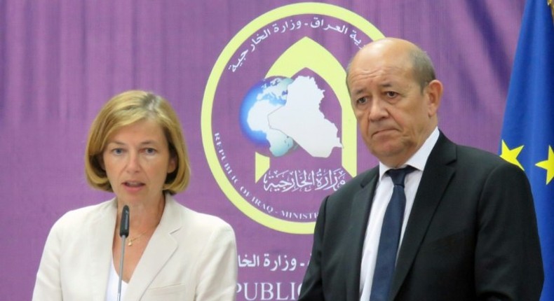 French Foreign Affairs Minister Jean-Yves Le Drian (R) and French Defence Minister Florence Parly (L) attend a press conference following a meeting with Iraqi Foreign Minister in Baghdad