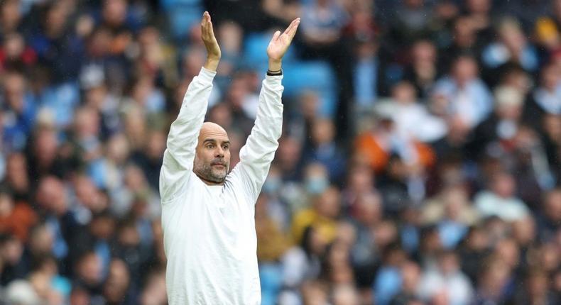 All over: Pep Guardiola will step down as Man City coach at end of his next contract Creator: Adrian DENNIS
