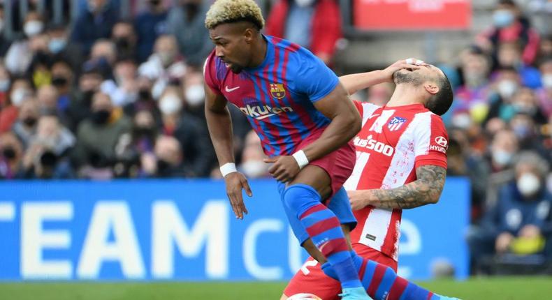 Adama Traore (left) was key to Barcelona's 4-2 win over Atletico Madrid in La Liga last weekend. Creator: LLUIS GENE