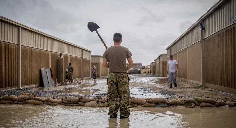 Soldiers in a flooded area of Camp Arifjan in Kuwait in November 2018.