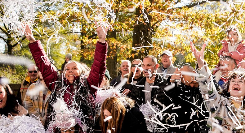 Spectators shower performers with confetti during the Macy's Thanksgiving Day Parade, Thursday, Nov. 24, 2022, in New York.AP Photo/Julia Nikhinson