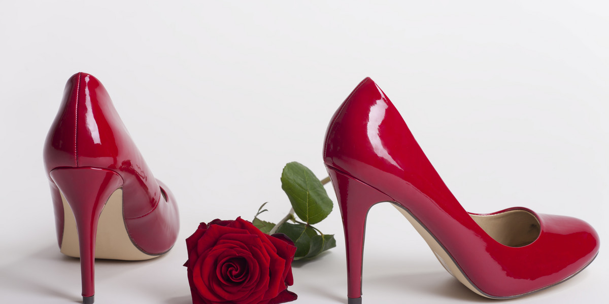 red high heels on white background 