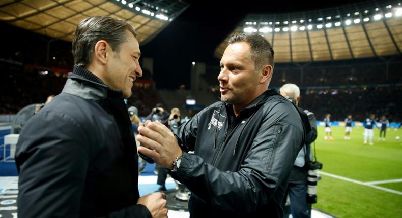 Hertha Berlin head coach Pal Dardai (R) hopes to get one over Bayern Munich boss Niko Kovac (L) when the two clubs meet in the German Cup