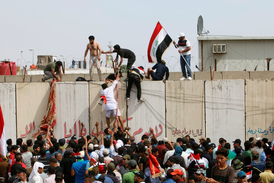 Followers of Iraq's Shiite cleric Muqtada al-Sadr storm Baghdad's Green Zone after lawmakers failed to convene for a vote on overhauling the government in Iraq on April 30.