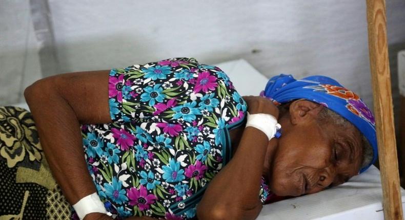 A woman is treated in the Yemeni coastal city of Hodeida, which has seen cases nearly triple in the past three months alone as conflict helps to spread the disease