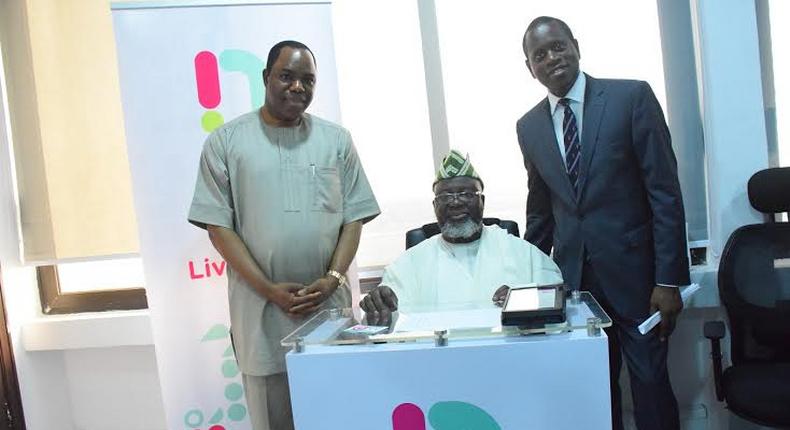 Dr. Tunde Ayeni, chairman NatCom (l) and Kamar Abass, CEO ntel presenting a gift to Barrister Adebayo Shittu, Honourable Minister of Communications at ntel’s Marina Office in Lagos when the Minister paid the company a courtesy visit.