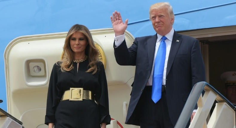 US President Donald Trump and First Lady Melania Trump step off Air Force One upon arrival at King Khalid International Airport in Riyadh on May 20, 2017