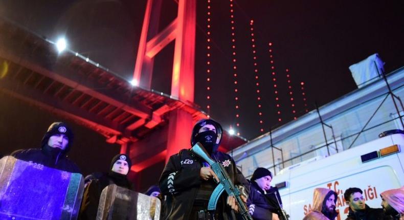 Turkish anti-riot police officers stand guard at the site of an armed attack at an Istanbul nightclub on January 1, 2017