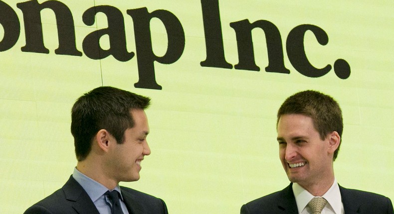 Snapchat co-founders Bobby Murphy, left, and CEO Evan Spiegel ring the opening bell at the New York Stock Exchange as the company celebrates its IPO, Thursday, March 2, 2017