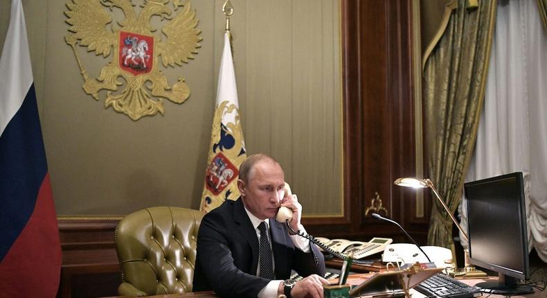 Russian President Vladimir Putin speaks on the phone in his office in Saint Petersburg, Russia, on December 15, 2018.Aleksey Nikolsky/Sputnik/AFP via Getty Images