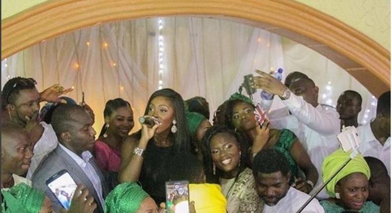 Tiwa Savage surprises bride at her wedding ceremony