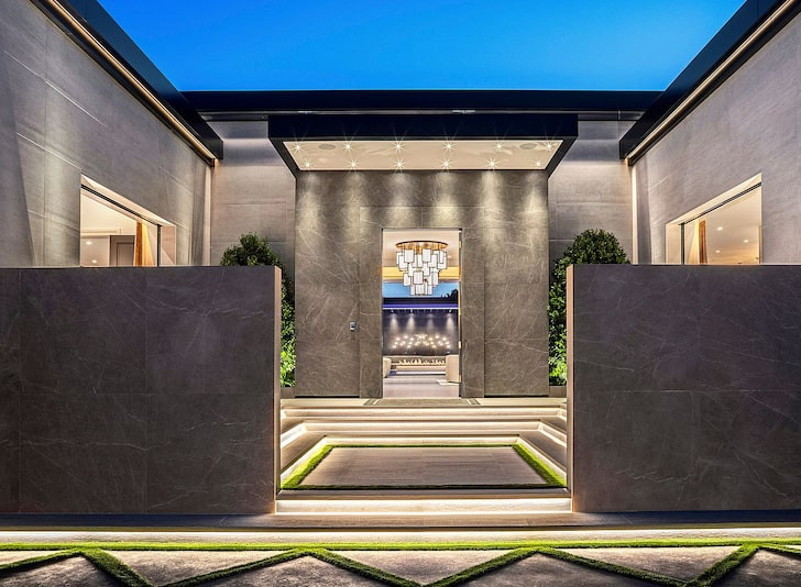 The house is 15,350 square feet and it's billed as a resort compound. It's a single-story, modern compound with a dedicated guardhouse.  [TMZ]