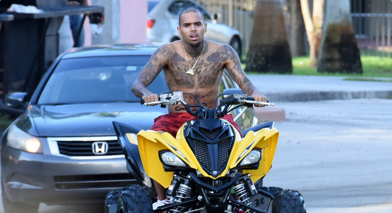 Chris Brown on an ATV