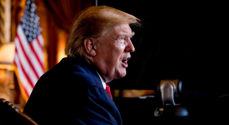 FILE - In this Dec. 24, 2019 photo, President Donald Trump speaks to members of the media following a Christmas Eve video teleconference with members of the military at his Mar-a-Lago estate in Palm Beach, Fla. As a candidate for the White House, Donald Trump repeatedly promised that he would immediately replace President Barack Obamas health care law with a plan of his own that would provide insurance for everybody. Back then, Trump made it sound that his plan  much less expensive and much better than the Affordable Care Act  was imminent. And he put drug companies on notice that their pricing power no longer would be politically protected. Nearly three years after taking office, Americans still are waiting for Trumps big reveal. (AP Photo/Andrew Harnik)