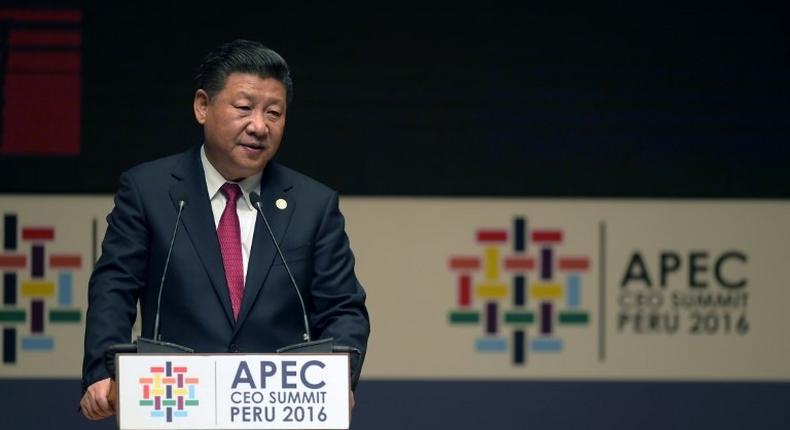 China's President Xi Jinping speaks during a session of the APEC CEO Summit, part of the broader Asia-Pacific Economic Cooperation Summit in Lima on November 19, 2016