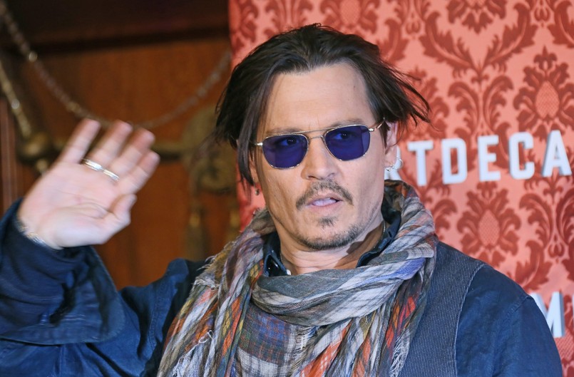 Do stolicy Niemiec Johnny Depp przyleciał, by promować swój nowy film "Bezwstydny Mortdecai"