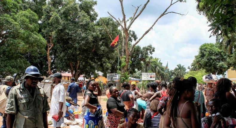 Congolese migrants (pictured October 2018) gather at Chissanda border post in Dundo in northern Angola, as the Angolan government repatriates thousands of illegal immigrants as part of an operation to target diamond smuggling