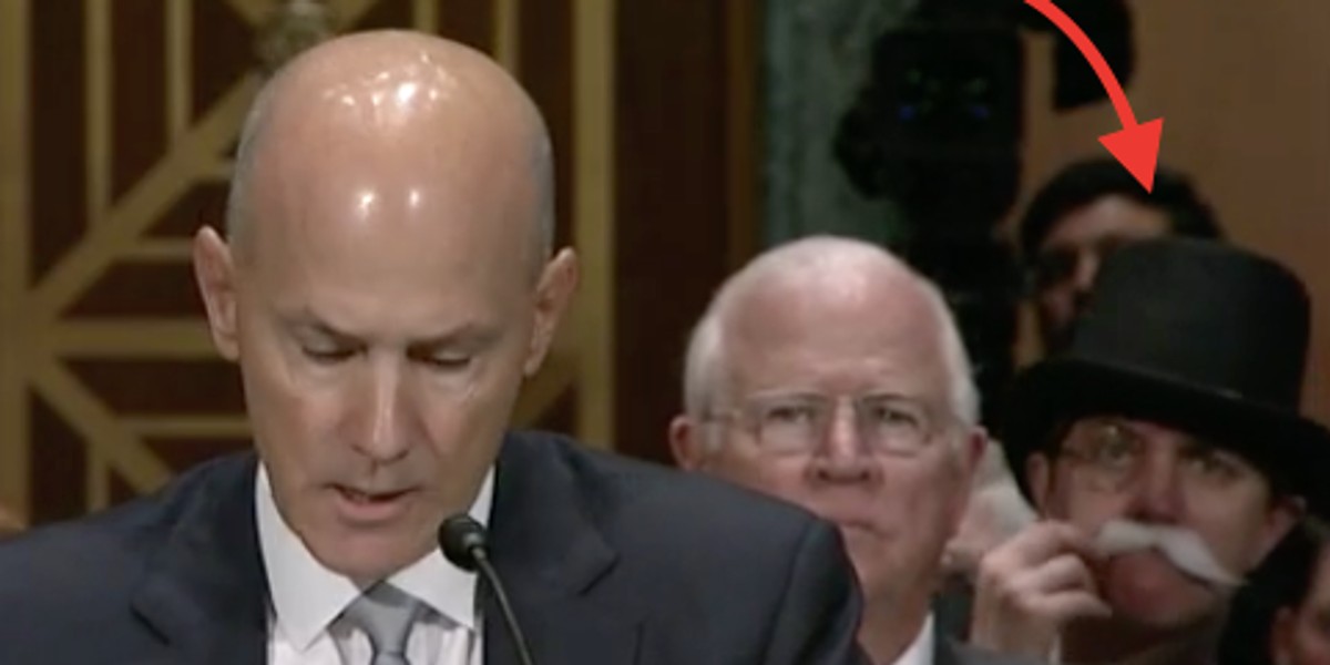 Someone dressed up as the Monopoly man is trolling the ex-Equifax CEO's hearing in Congress