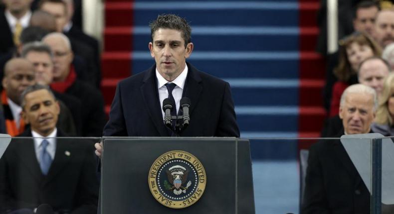 Poet Richard Blanco speaks at the U.S. Capitol in Washington during the inauguration for President Barack Obama, left, and Vice President Joe Biden right. 