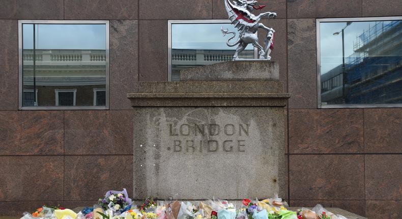 Flowers are pictured at the south-side of London Bridge.