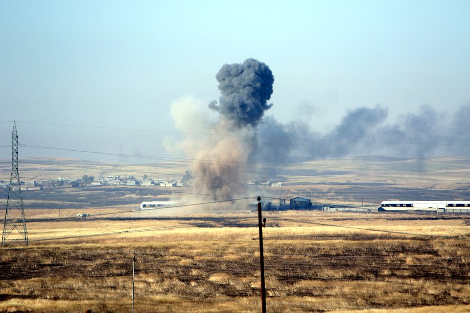 Smoke rises after airstrikes from the US-led coalition against Islamic State militants in a village east of Mosul, Iraq, May 29, 2016.