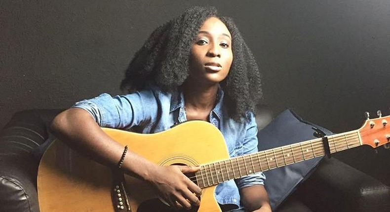 Aramide with her guitar