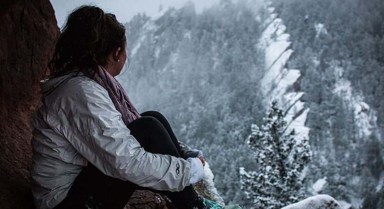 Lady observing snow