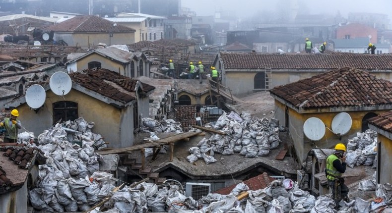 Workers on the roof of Istanbul's iconic marketplace, the Grand Bazaar undergoing renovation.