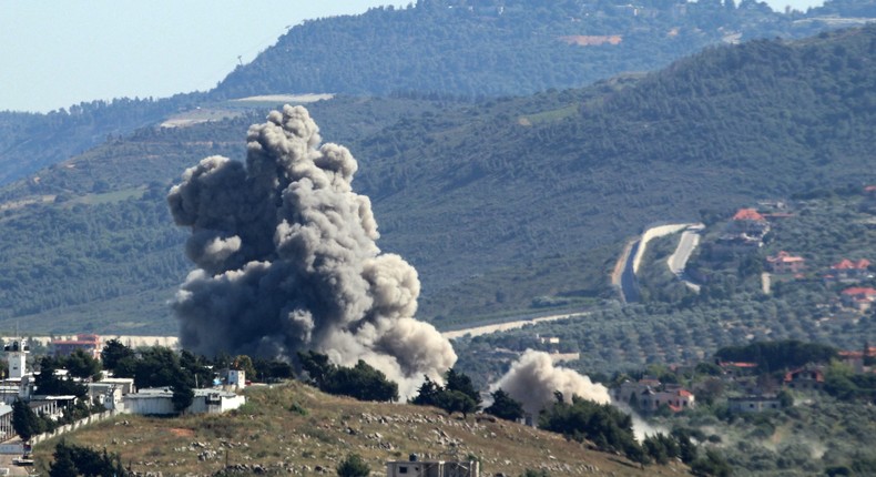 A smoke plume rises over the southern Lebanese village of Kfar Kila during Israeli bombardment on May 16, 2024.RABIH DAHER/AFP via Getty Images