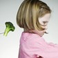 Young Girl Refusing To Eat Her Greens